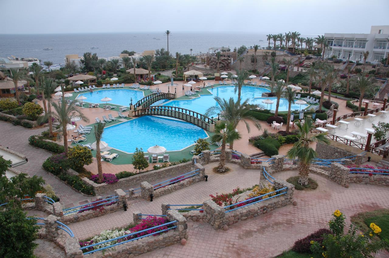 Шарм клуб бич. Queen Шарм Резорт Шарм-Эль-Шейх. Египет отель Квин Шарм. Отель Египет Queen Sharm Resort view Beach. Шарм-Эль-Шейх Queen Sharm Resort 4.